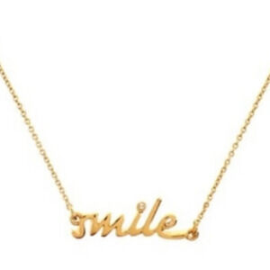 Kate Spade Say yes collection " Smile" gold necklace pendant